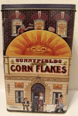 Plechová prolisovaná dóza - plechovka  Domeček Corn Flakes