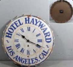 Nástěnné kovové hodiny Hotel Los Angeles - pivní zátka