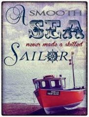 Plechová cedule loď A smooth sea never made a skilled Sailor