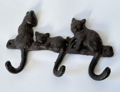 Litinový věšák Kočky