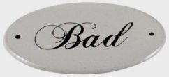 Kovová cedulka na dveře Bad